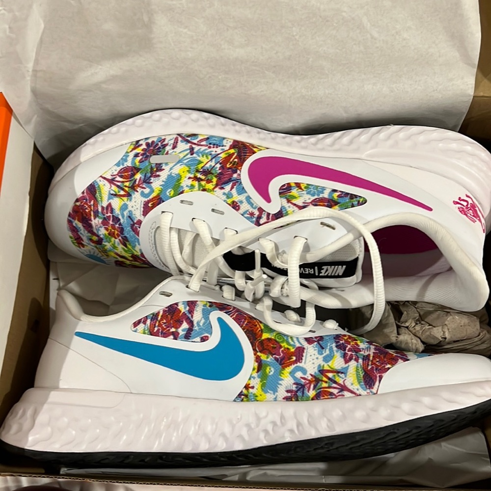 Multi colored Nike revolution 5 fable